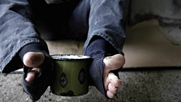 beggar-holding-a-cup-with-his-feet-video-id485343015